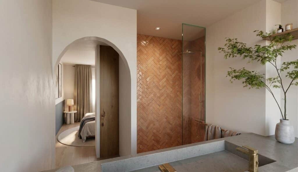 Transformation Leroy 8 salle de bain avec zellige en chevron terracota, ouverture sur la chambre avec une arche et dressing sur mesure